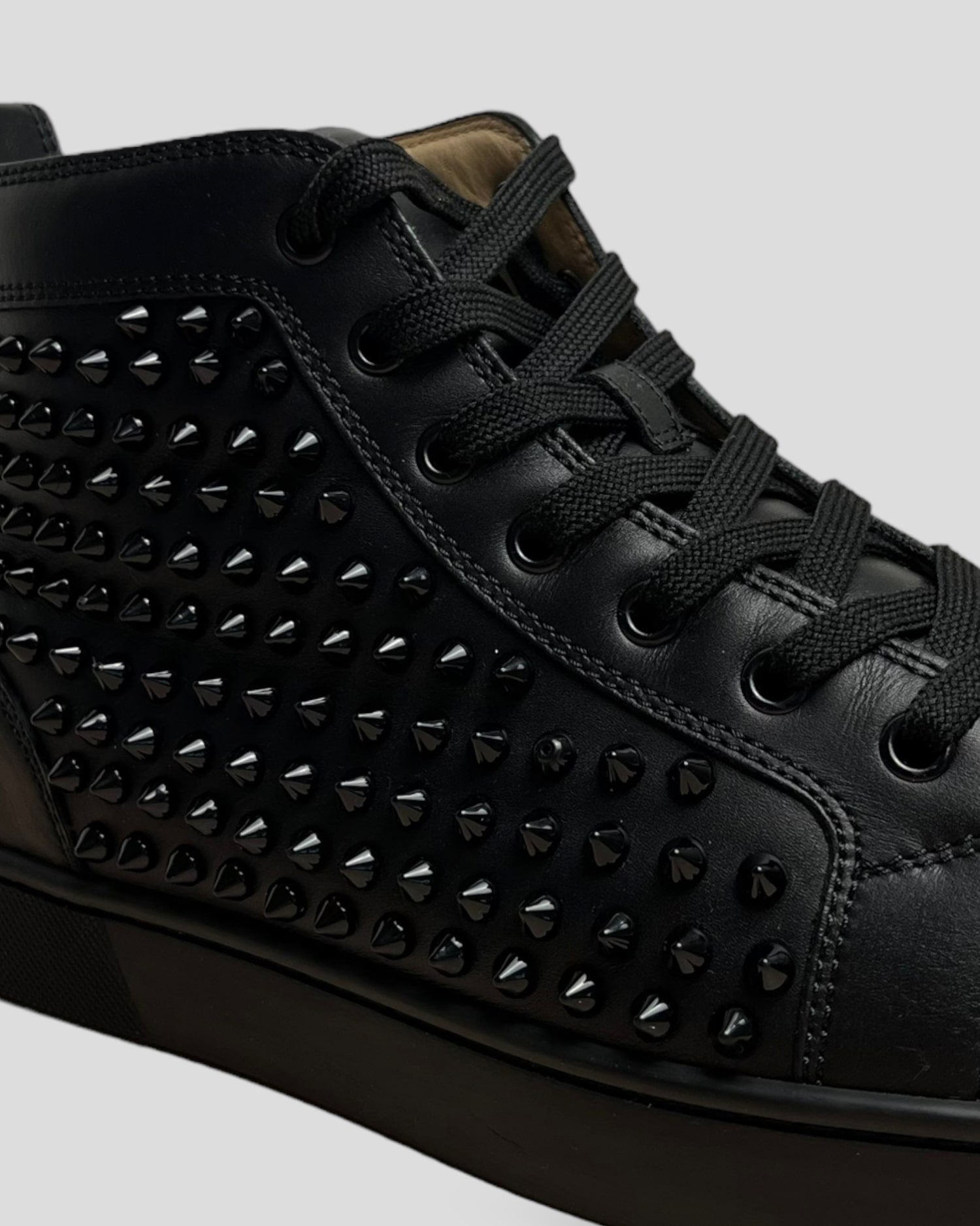 Black studded louboutin trainers online